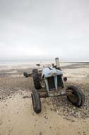 An old tractor used for boat launching at Sheringham Beach, Norfolk