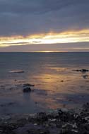 Sunrise glow at West Runton beach near Cromer, Norfolk